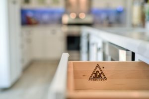 White Cabinets, Black Stainless Steel Appliances & Black drawer pulls and handles