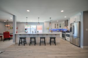 White Cabinets, Black Stainless Steel Appliances & Black drawer pulls and handles