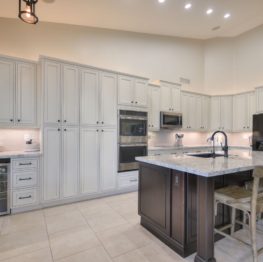 White Cabinets with dark drawer pulls and knobs